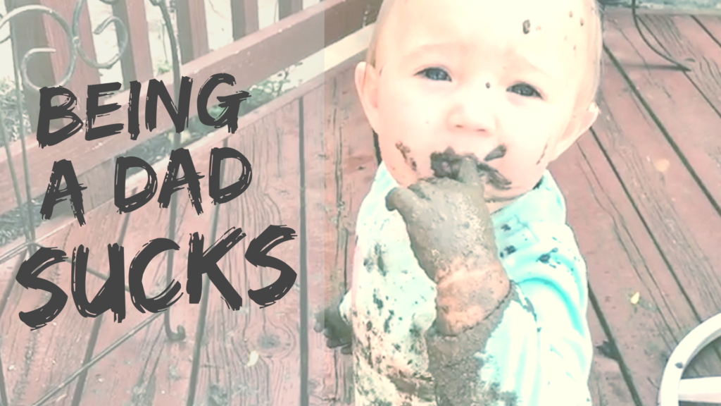 baby covered in mud - being a dad sucks